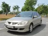 Dịch vụ thay kính chắn gió xe Mitsubishi Lancer tại nhà